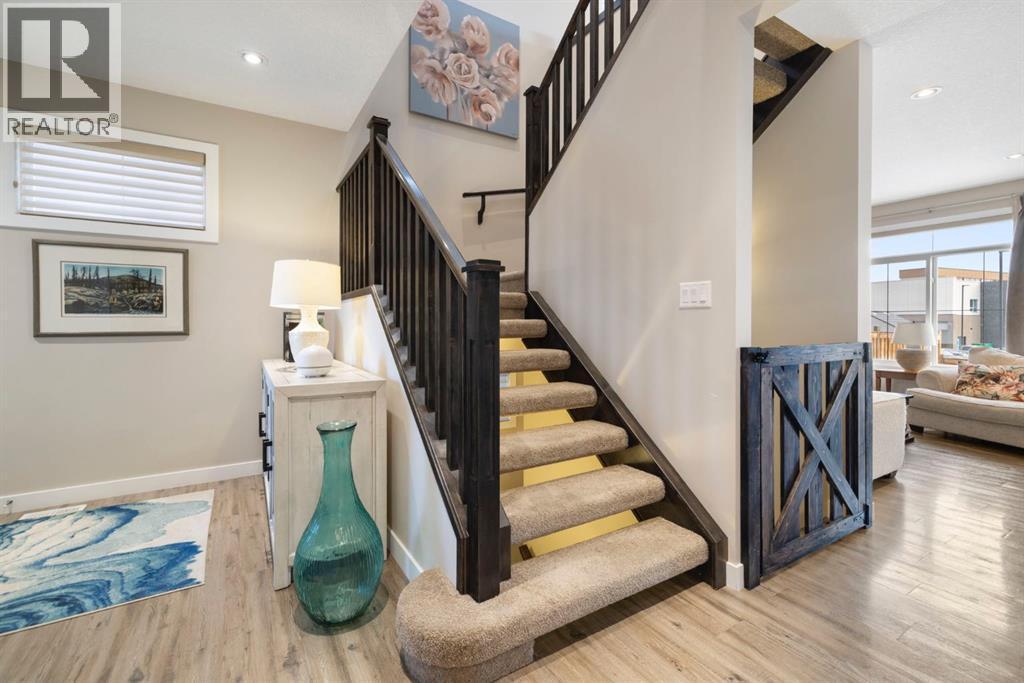 8 Emberside Glen, Cochrane, AB - Indoor Photo Showing Other Room