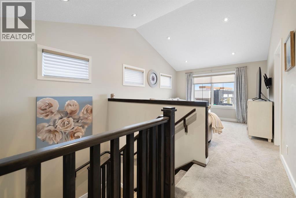 8 Emberside Glen, Cochrane, AB - Indoor Photo Showing Other Room