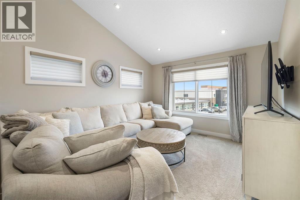 8 Emberside Glen, Cochrane, AB - Indoor Photo Showing Living Room