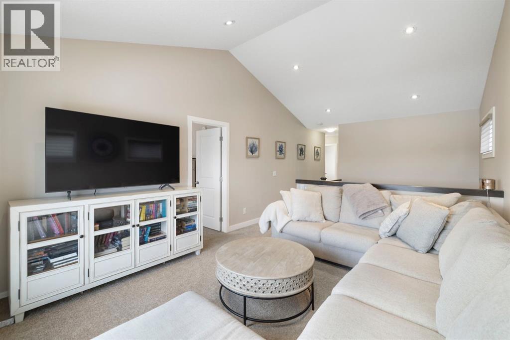 8 Emberside Glen, Cochrane, AB - Indoor Photo Showing Living Room