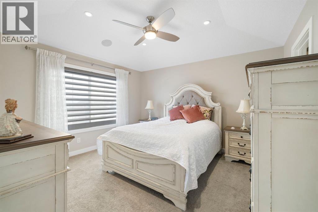 8 Emberside Glen, Cochrane, AB - Indoor Photo Showing Bedroom