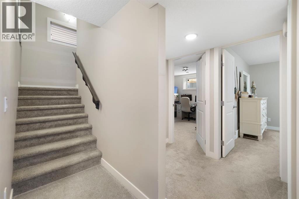 8 Emberside Glen, Cochrane, AB - Indoor Photo Showing Other Room