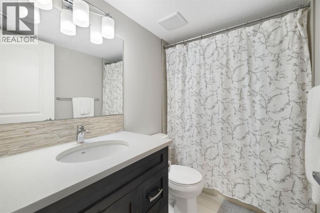 8 Emberside Glen, Cochrane, AB - Indoor Photo Showing Bathroom