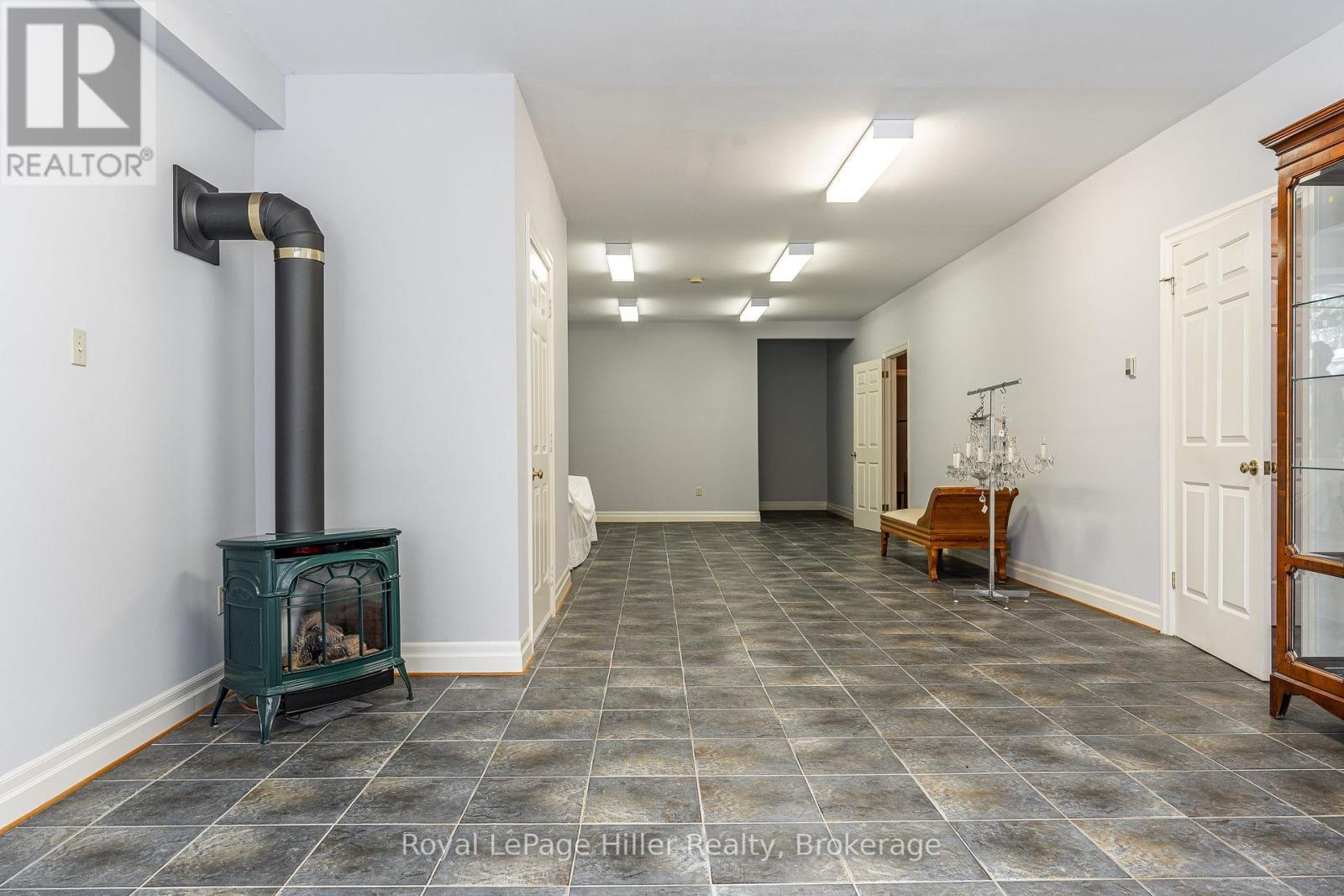 Rec room with Gas Stove - 530 Holmes Street, Central Huron (Goderich), ON - Indoor Photo Showing Other Room