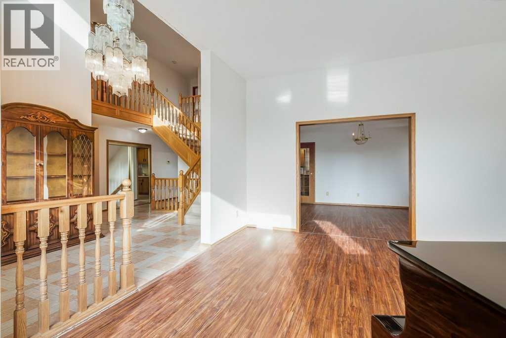 Living Room - 106 Sienna Hills Drive Sw, Calgary, AB - Indoor Photo Showing Other Room