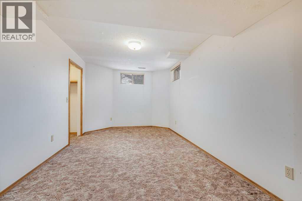 Bedroom (Basement) - 106 Sienna Hills Drive Sw, Calgary, AB - Indoor Photo Showing Other Room