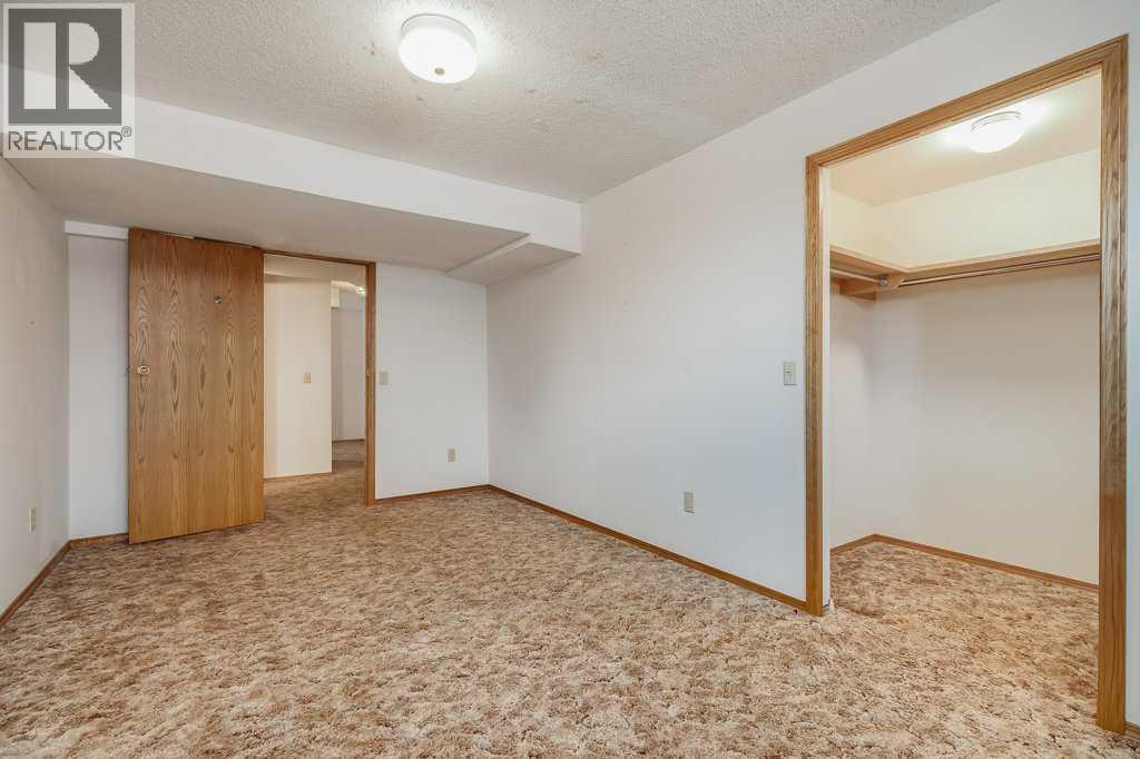 Bedroom (Basement) - 106 Sienna Hills Drive Sw, Calgary, AB - Indoor Photo Showing Other Room