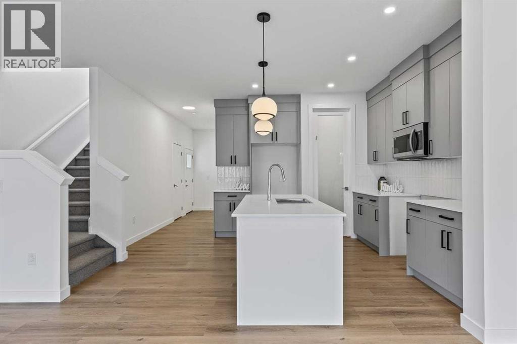 90 Heritage Circle, Cochrane, AB - Indoor Photo Showing Kitchen