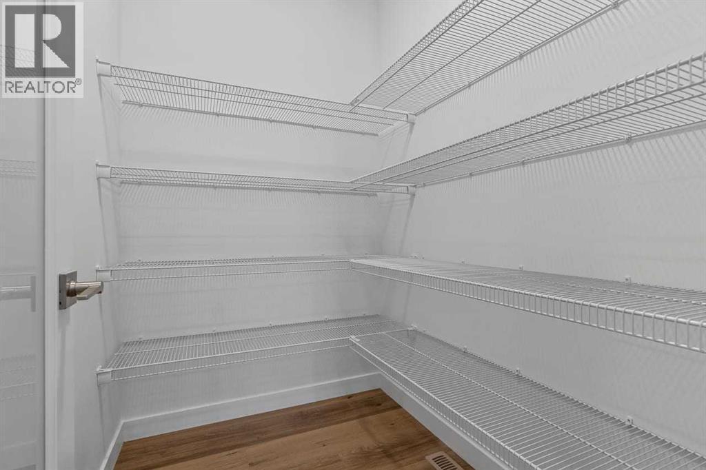 90 Heritage Circle, Cochrane, AB - Indoor With Storage