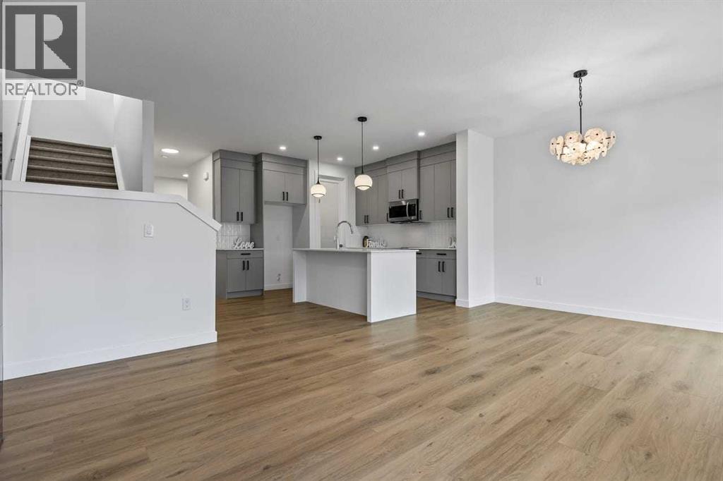 90 Heritage Circle, Cochrane, AB - Indoor Photo Showing Kitchen