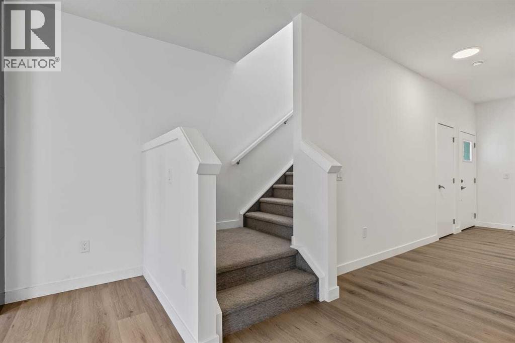 90 Heritage Circle, Cochrane, AB - Indoor Photo Showing Other Room