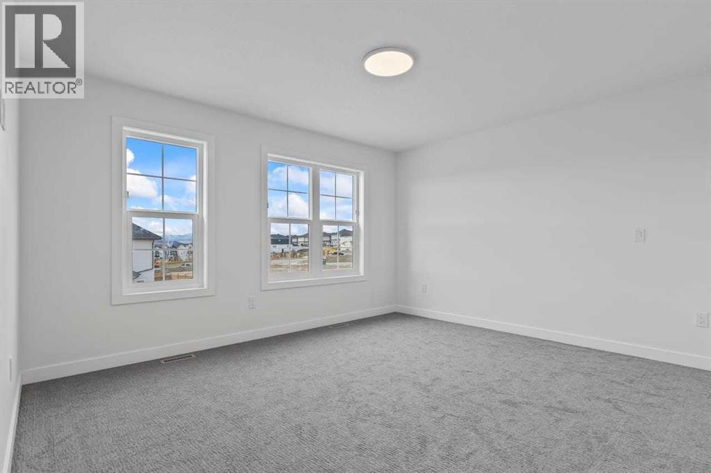 90 Heritage Circle, Cochrane, AB - Indoor Photo Showing Other Room