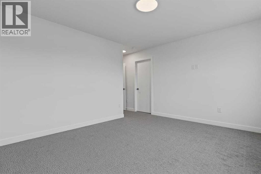 90 Heritage Circle, Cochrane, AB - Indoor Photo Showing Other Room