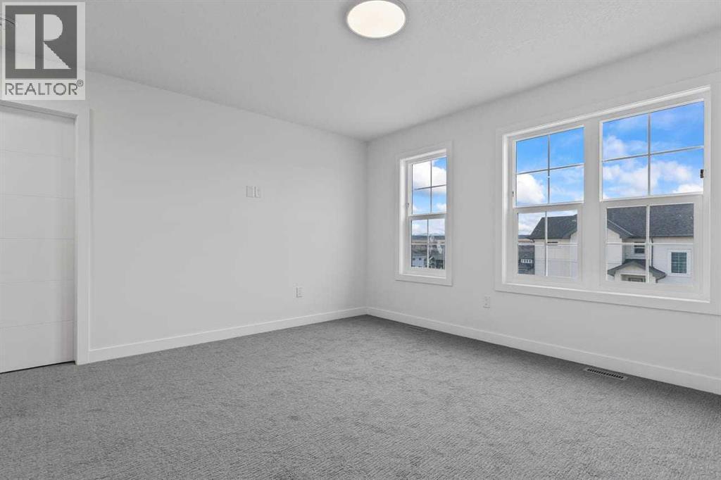 90 Heritage Circle, Cochrane, AB - Indoor Photo Showing Other Room