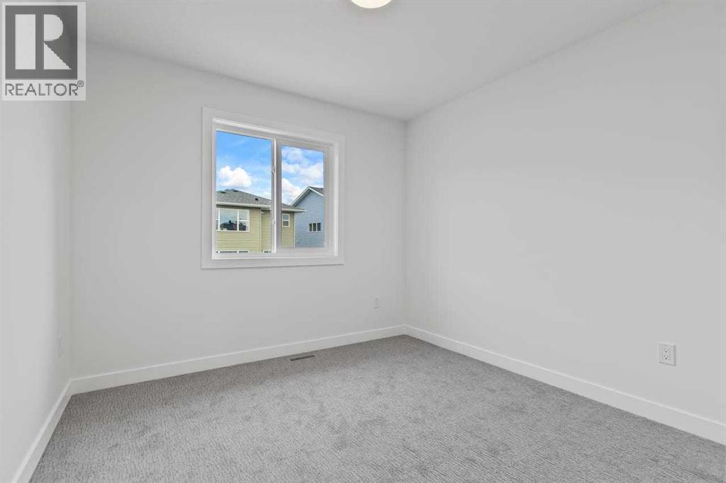 90 Heritage Circle, Cochrane, AB - Indoor Photo Showing Other Room