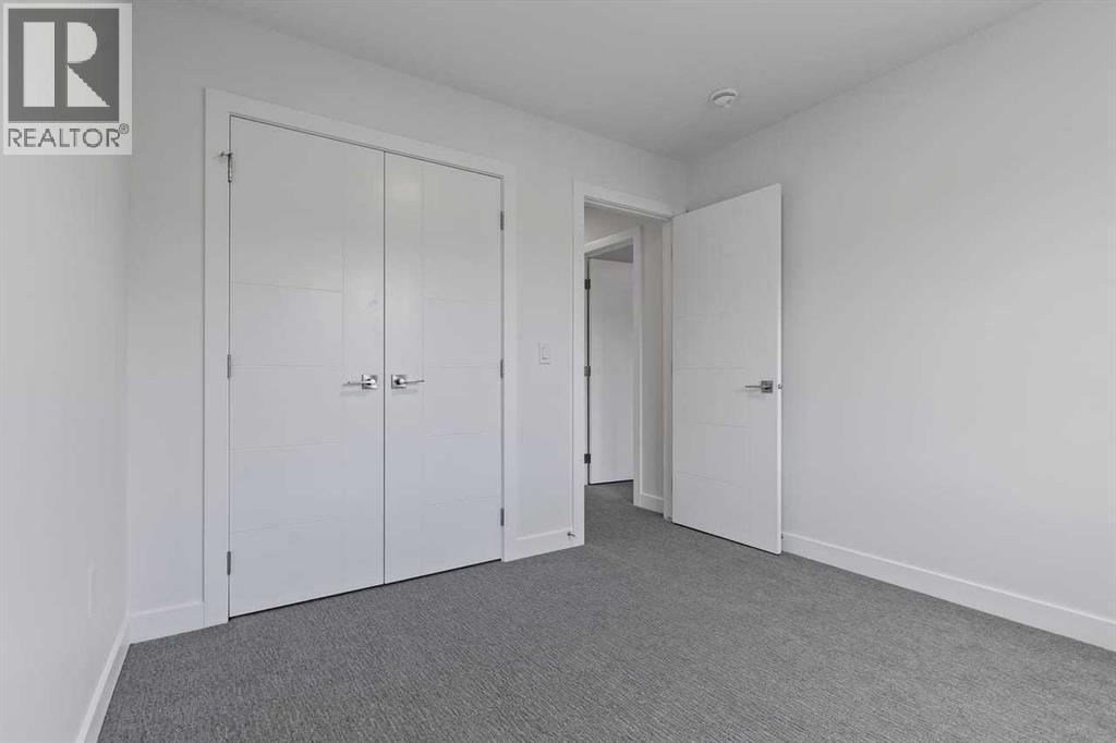 90 Heritage Circle, Cochrane, AB - Indoor Photo Showing Other Room