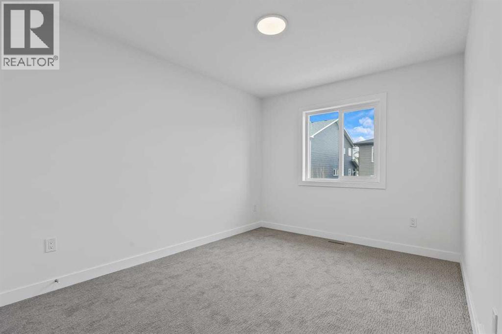 90 Heritage Circle, Cochrane, AB - Indoor Photo Showing Other Room