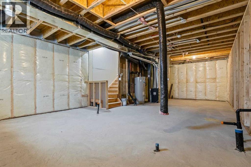 90 Heritage Circle, Cochrane, AB - Indoor Photo Showing Basement