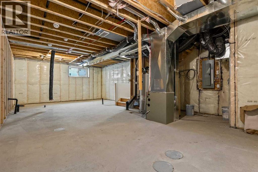 90 Heritage Circle, Cochrane, AB - Indoor Photo Showing Basement