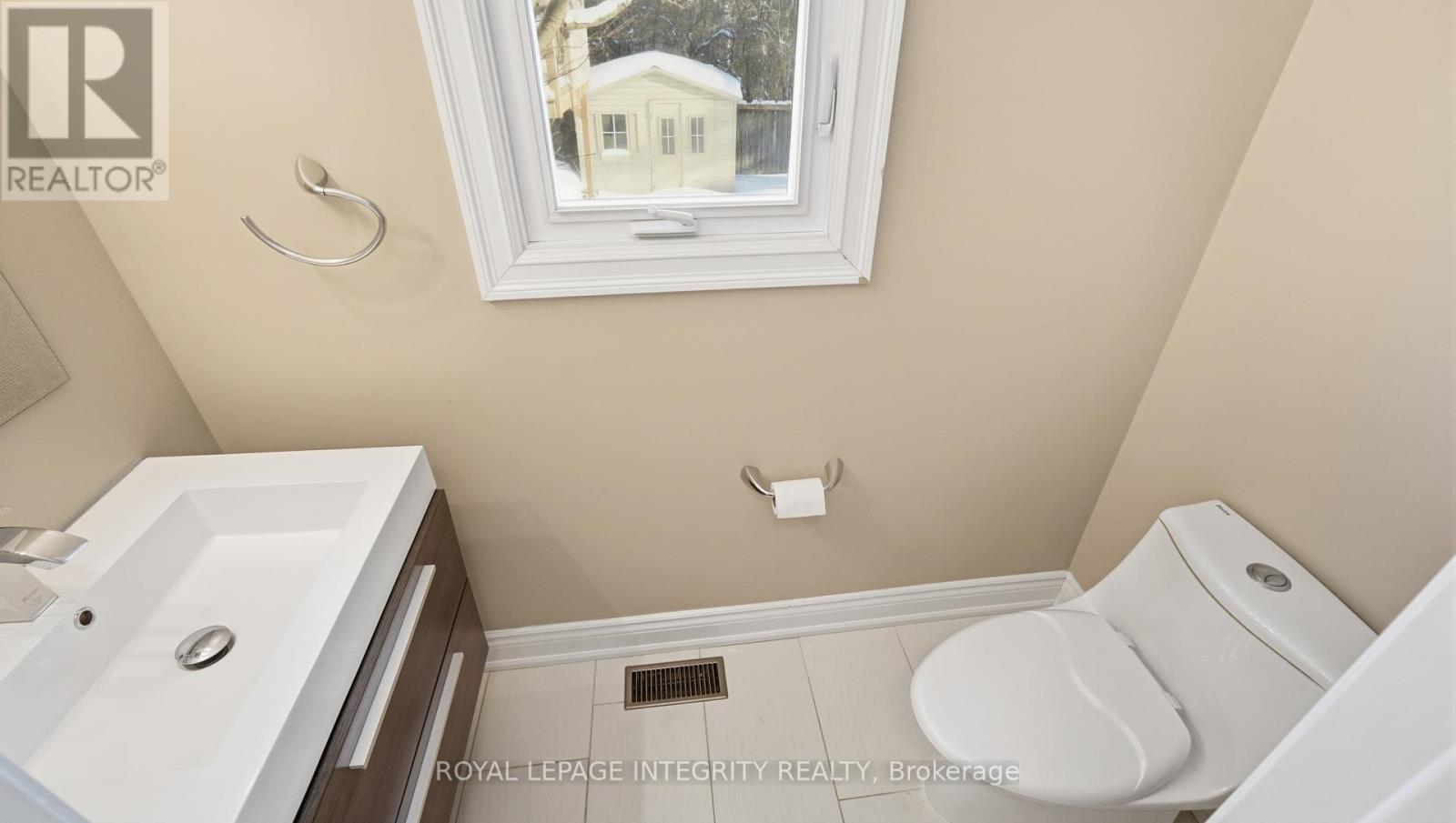 Powder room with heated floor - 1055 Plante Drive, Ottawa, ON - Indoor Photo Showing Laundry Room