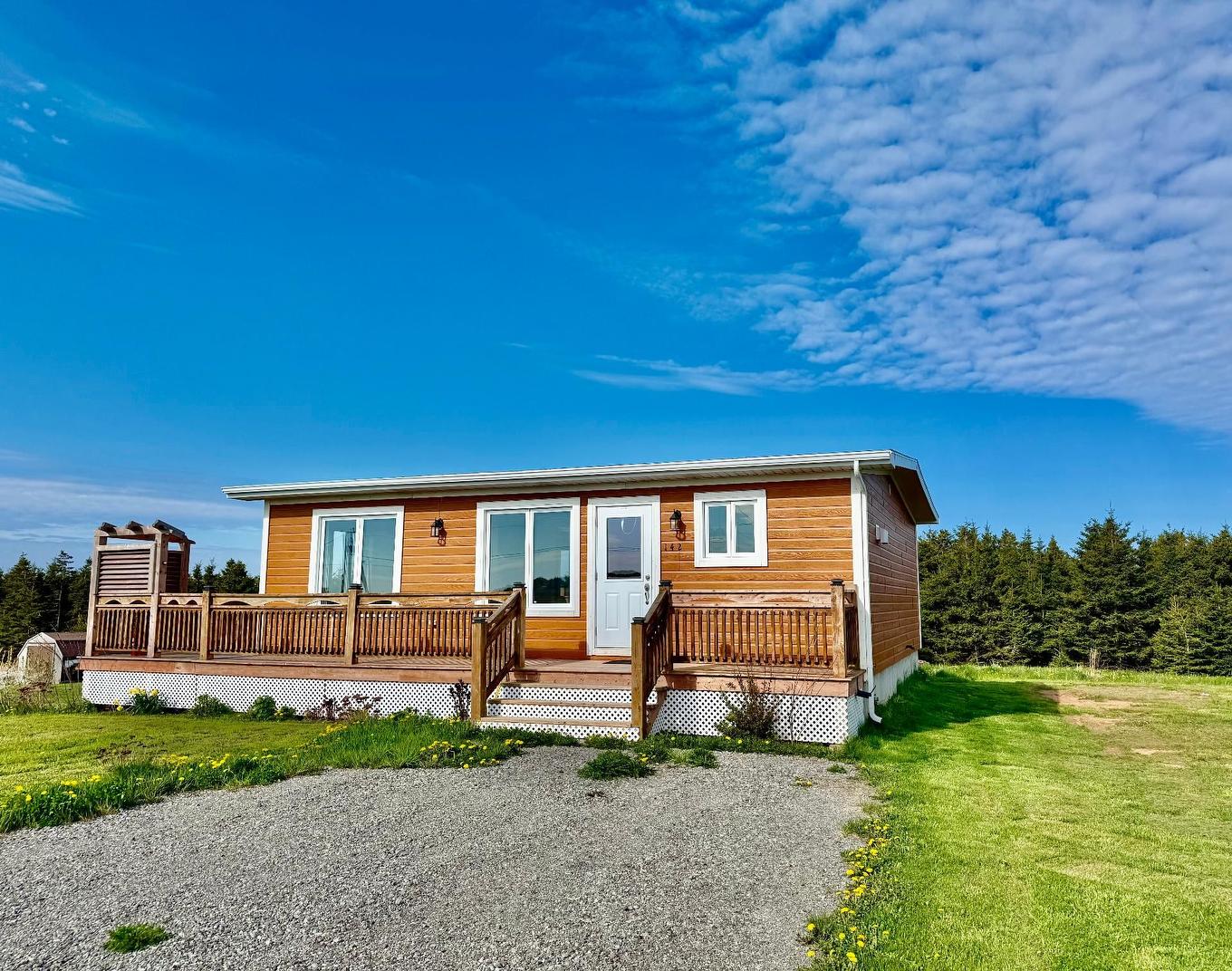 Façade - 142 Ch. Marcoux, Les Îles-De-La-Madeleine, QC - Outdoor With Deck Patio Veranda