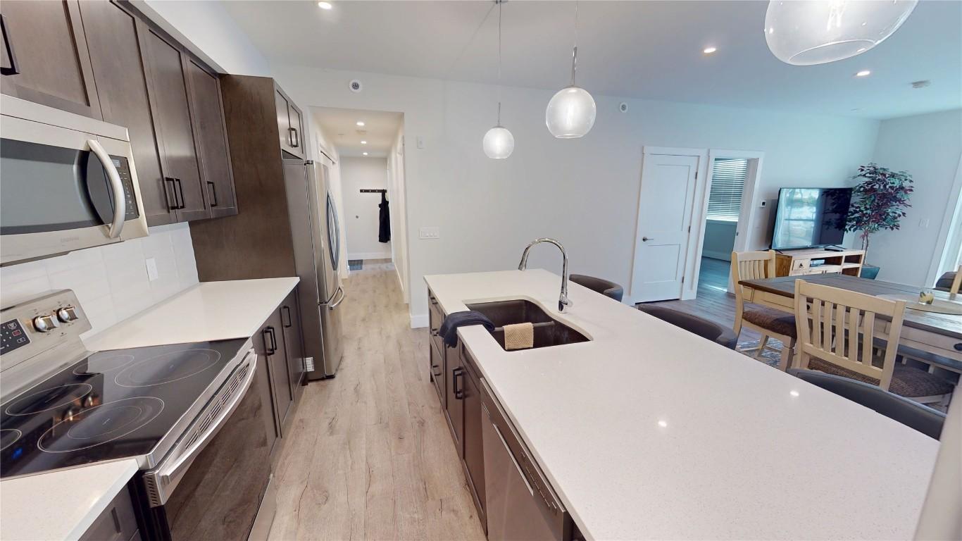 212-355 Legacy Lookout, Cranbrook, BC - Indoor Photo Showing Kitchen With Double Sink With Upgraded Kitchen