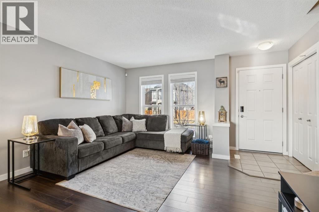 322 Cranford Park Se, Calgary, AB - Indoor Photo Showing Living Room