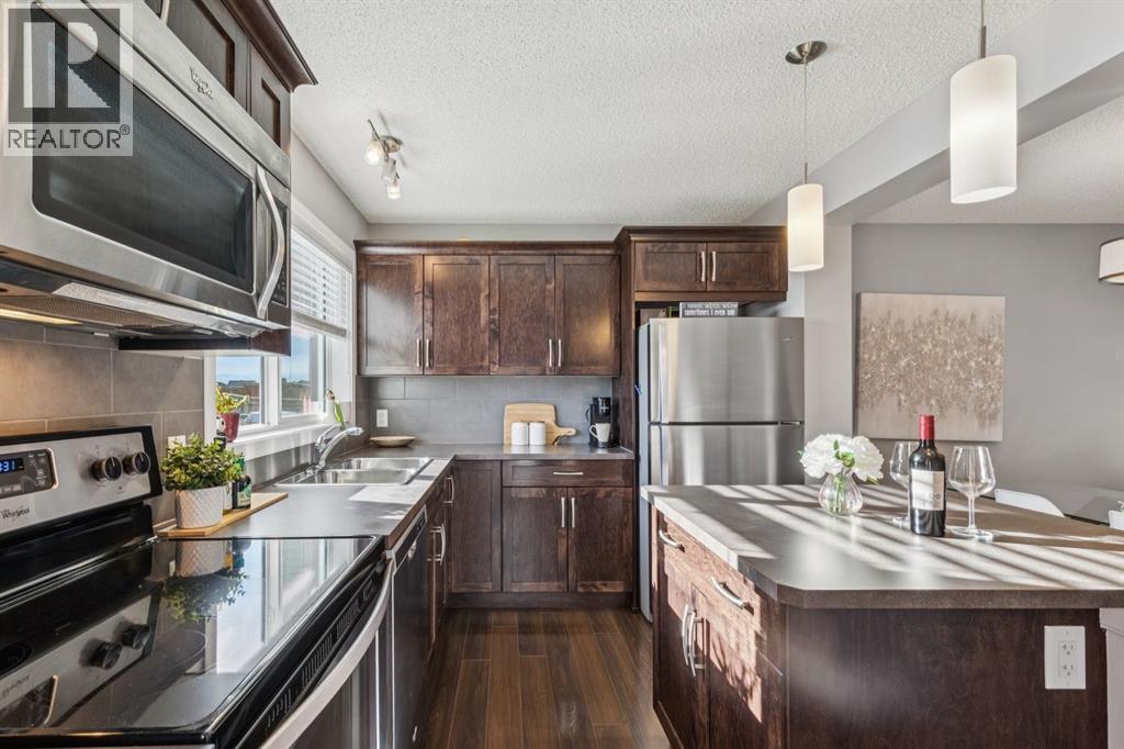 322 Cranford Park Se, Calgary, AB - Indoor Photo Showing Kitchen With Stainless Steel Kitchen