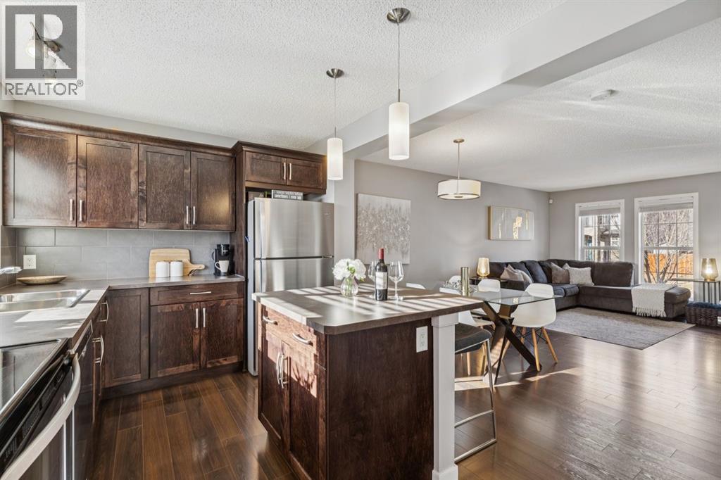 322 Cranford Park Se, Calgary, AB - Indoor Photo Showing Kitchen With Stainless Steel Kitchen With Double Sink