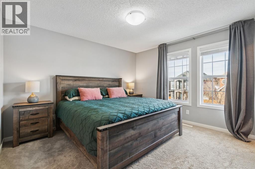 322 Cranford Park Se, Calgary, AB - Indoor Photo Showing Bedroom