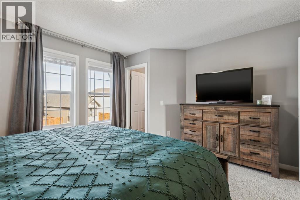 322 Cranford Park Se, Calgary, AB - Indoor Photo Showing Bedroom
