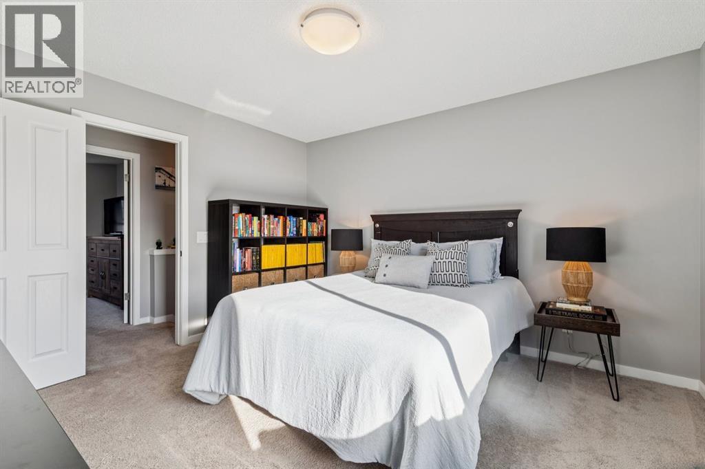 322 Cranford Park Se, Calgary, AB - Indoor Photo Showing Bedroom