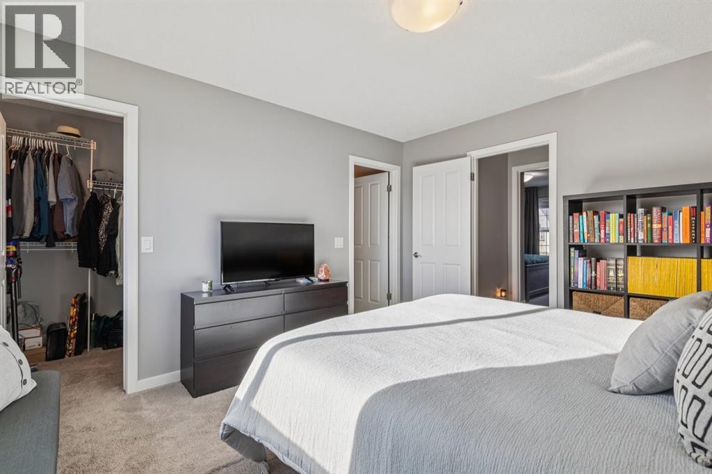 322 Cranford Park Se, Calgary, AB - Indoor Photo Showing Bedroom