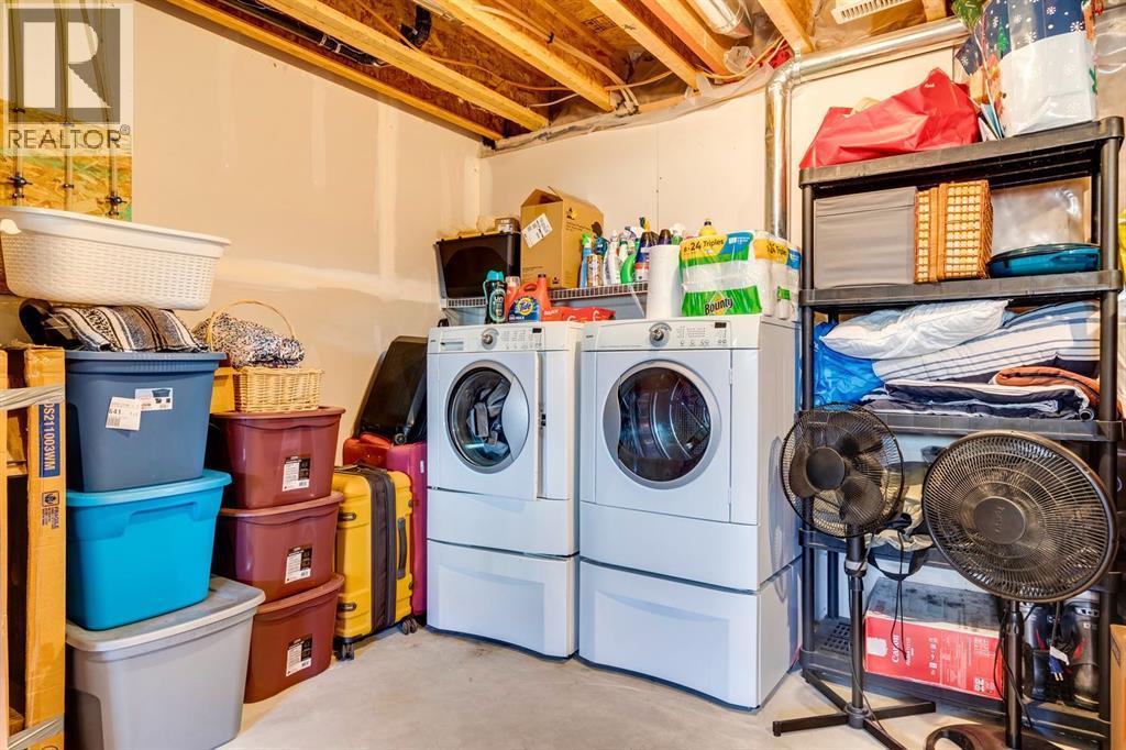 322 Cranford Park Se, Calgary, AB - Indoor Photo Showing Laundry Room