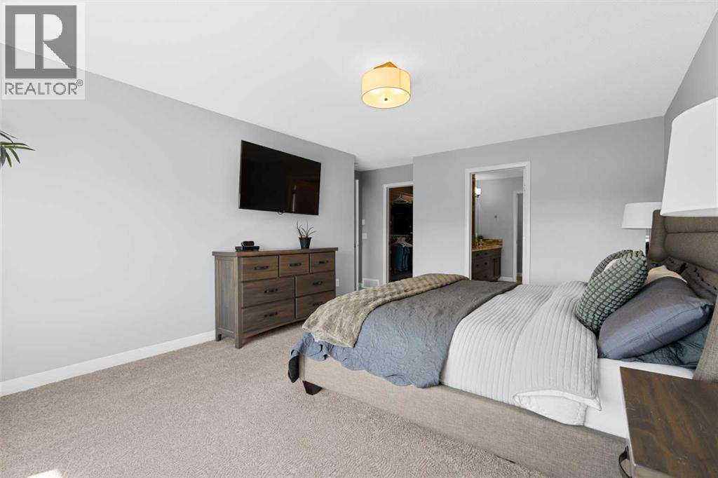 103 Masters Rise Se, Calgary, AB - Indoor Photo Showing Bedroom