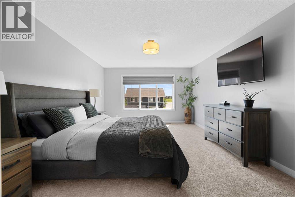 103 Masters Rise Se, Calgary, AB - Indoor Photo Showing Bedroom