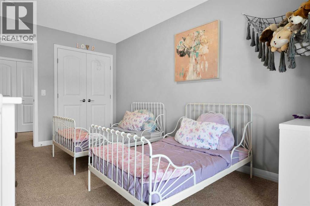 103 Masters Rise Se, Calgary, AB - Indoor Photo Showing Bedroom