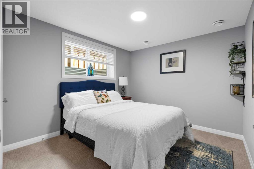 103 Masters Rise Se, Calgary, AB - Indoor Photo Showing Bedroom