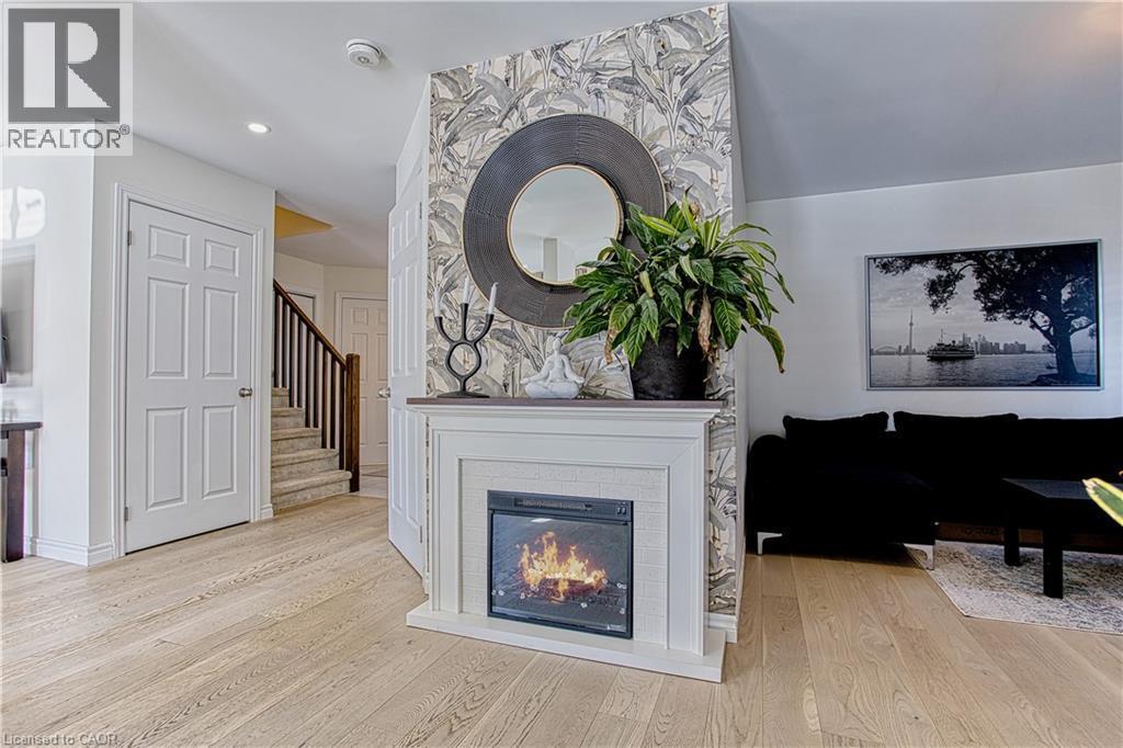32 Hudson Drive, Cayuga, ON - Indoor Photo Showing Living Room With Fireplace
