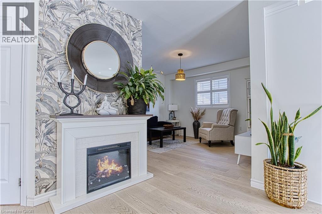 32 Hudson Drive, Cayuga, ON - Indoor Photo Showing Living Room With Fireplace