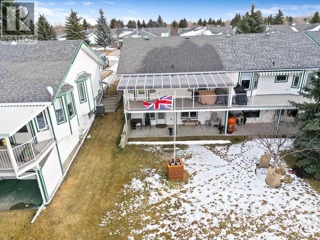 Back deck and patio - 509 Highview Point Nw, High River, AB - Outdoor With Deck Patio Veranda