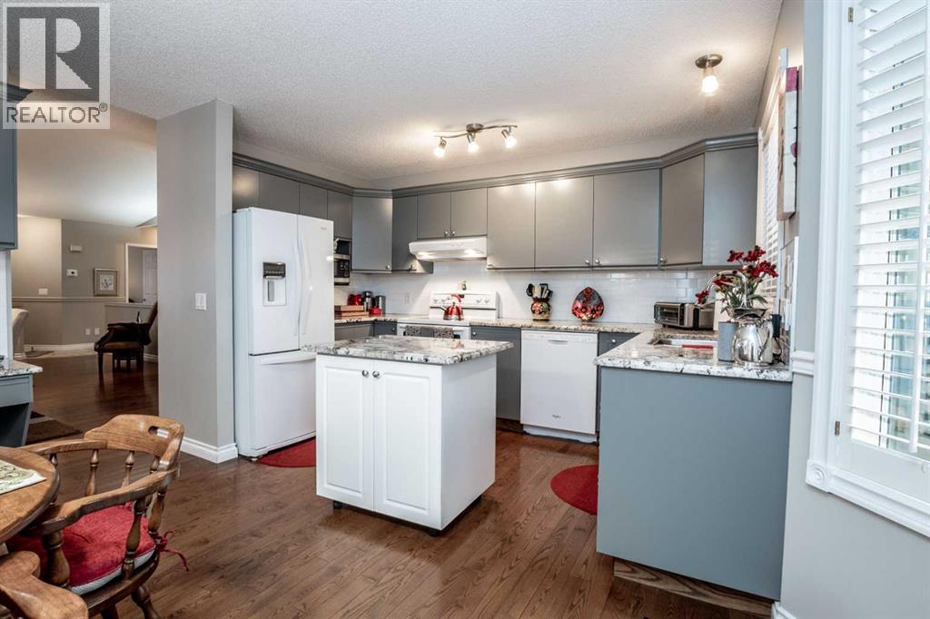 Granite Countertops - 509 Highview Point Nw, High River, AB - Indoor Photo Showing Kitchen