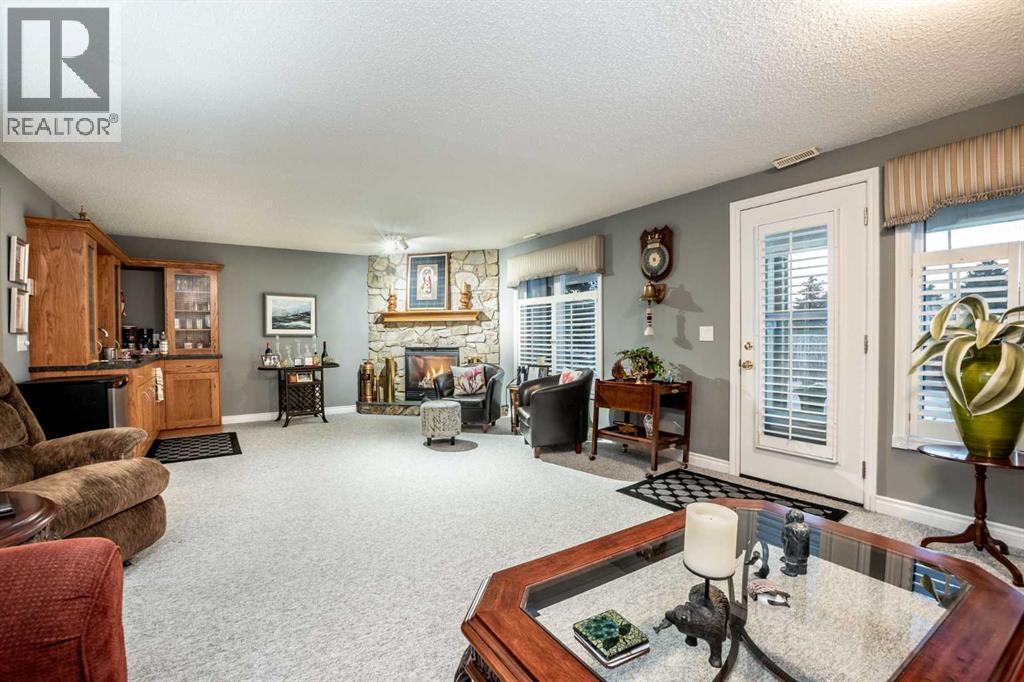 Great room to entertain - 509 Highview Point Nw, High River, AB - Indoor Photo Showing Living Room With Fireplace