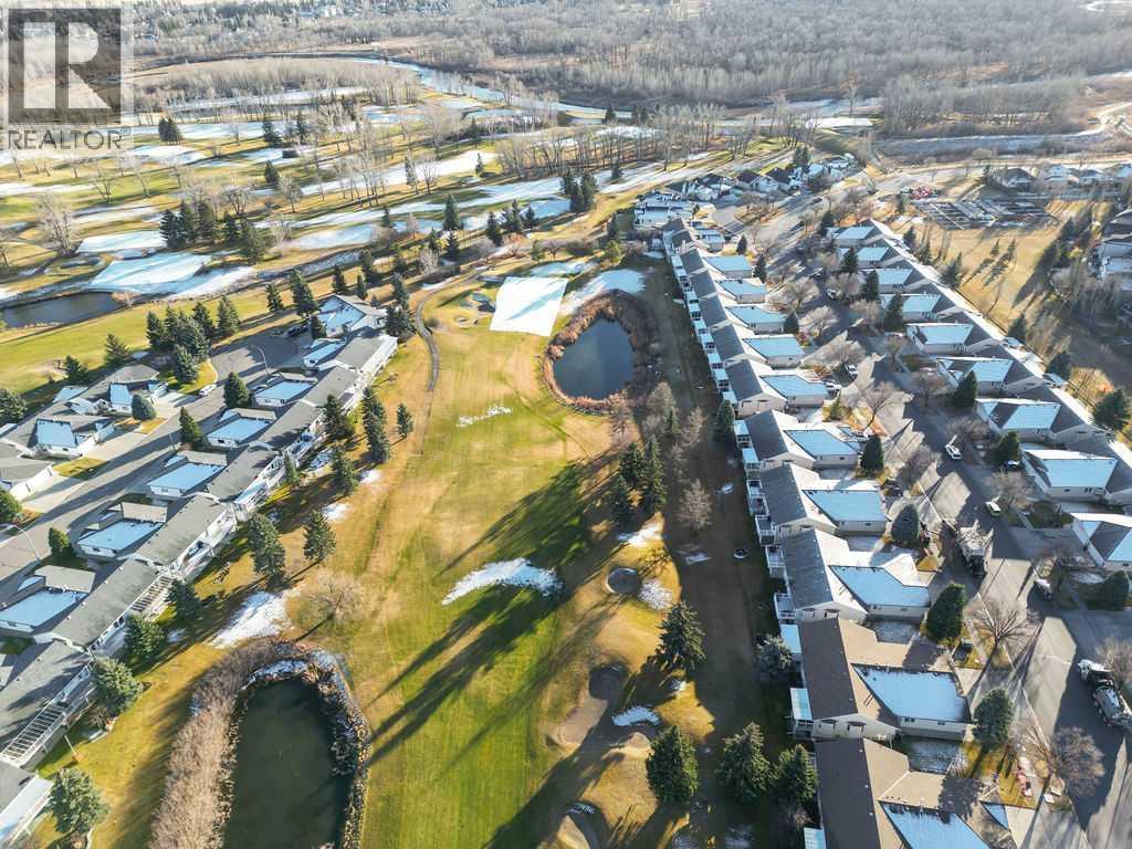 Plush and green in the summer monthsPark - 509 Highview Point Nw, High River, AB - Outdoor With View