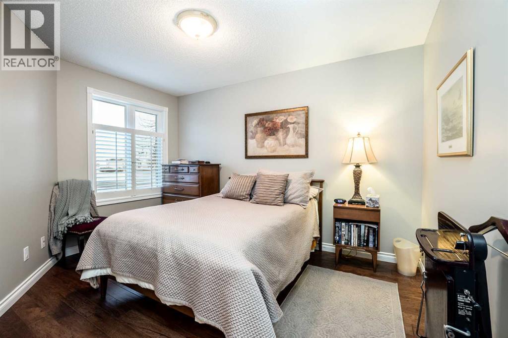 2nd Bedroom/Den - 509 Highview Point Nw, High River, AB - Indoor Photo Showing Bedroom