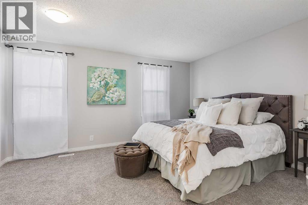 Primary bedroom - 292 Falton Drive Ne, Calgary, AB - Indoor Photo Showing Bedroom