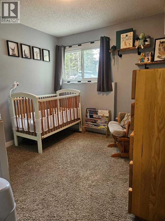 Bedroom - 2, 630 3Rd Street, Canmore, AB - Indoor Photo Showing Bedroom