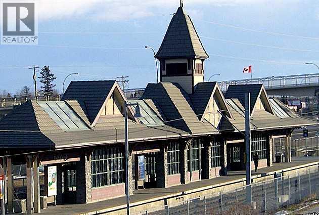 208, 30 Shawnee Common Sw, Calgary, AB - Outdoor