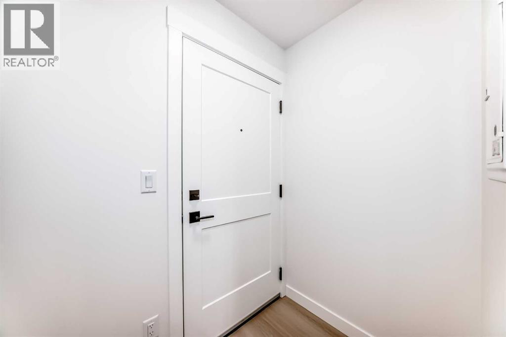 7320, 1802 Mahogany Boulevard Se, Calgary, AB - Indoor Photo Showing Other Room