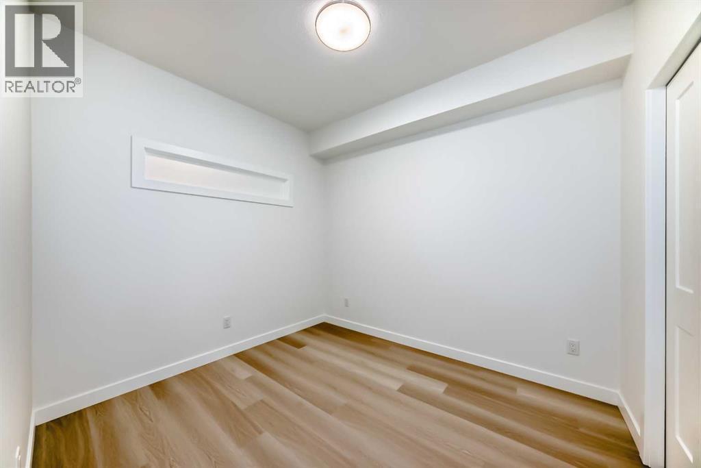 7320, 1802 Mahogany Boulevard Se, Calgary, AB - Indoor Photo Showing Other Room